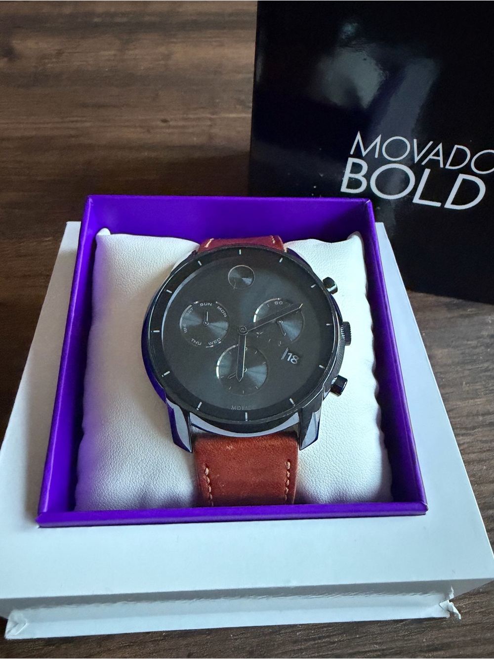 Movado Bold Blue and White Branded Booklet with Price Tag